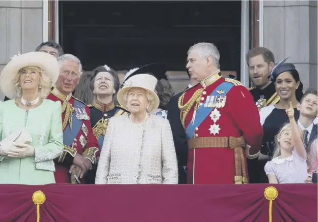  ?? ?? The Queen was joined by Prince Harry, Meghan and Prince Andrew at her official birthday flypast in 2019