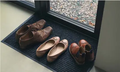  ?? ?? Shoes at the door, please. Photograph: Justin Paget/Getty Images