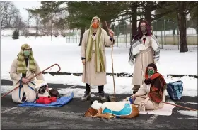  ??  ?? Shepherds and their Sheep from Trinity Lutheran Church, Kutztown.