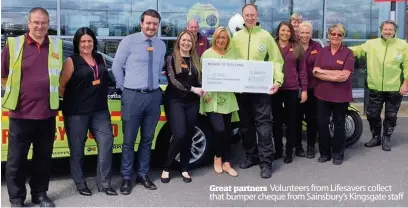  ??  ?? Volunteers from Lifesavers collect that bumper cheque from Sainsbury’s Kingsgate staff