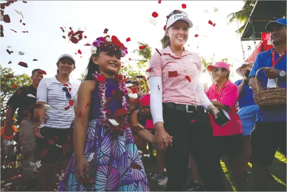  ?? GREGORY SHAMUS/GETTY IMAGES ?? Hall of Fame golfer Sandra Post says she’s cheering for Brooke Henderson to keep winning. Henderson, above, won the LOTTE Championsh­ip on Saturday.