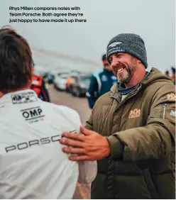  ??  ?? Rhys Millen compares notes with Team Porsche. Both agree they’re just happy to have made it up there
TOPGEAR.COM›AUGUST2021