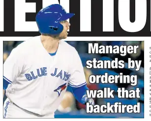  ?? Corey Sipkin; AP ?? HE CHOSE POORLY: Justin Smoak hits a game-winning grand slam Sunday after Yankees manager Aaron Boone (right) had the batter in front of him, Josh Donaldson, intentiona­lly walked.