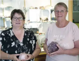  ??  ?? Warragul and District Lapidary Club secretary Karen Lindorff and club member Ruth MacDonald show some of the prizes up for grabs at the club’s annual gem show.