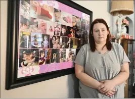  ?? NICK CAMMETT — THE ASSOCIATED PRESS ?? Jessica Day-Weaver poses next to a picture collage made for her daughter, Anastasia, at her home in Boardman, Ohio, on Thursday.