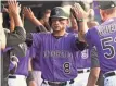  ?? RON CHENOY, USA TODAY SPORTS ?? Gerardo Parra and his Rockies teammates saw their odds rise, thanks to a trade.