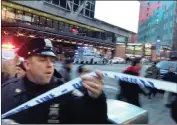  ?? PICTURE: AP ?? CRIME SCENE: Police at the scene of an explosion near Times Square in New York yesterday.