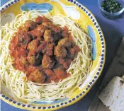  ?? SARA MOULTON VIA THE ASSOCIATED PRESS ?? Better meatballs with spaghetti, from a recipe by Sara Moulton.
