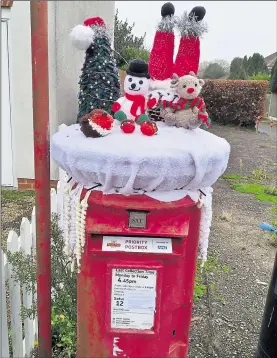  ?? Picture: Jeremy Baker ?? Residents are angry the post box in Rough Common Road, which has been decorated for Christmas, is being downgraded