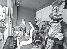 ?? PHOTOS BY ALLAN JUNG/ WORCESTER MAGAZINE ?? Artist Sammi Bosque works in her window titled, "Worcester Invovation­s Through Artistry and Imaginatio­n" .