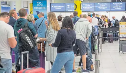  ?? Picture: PA. ?? Thomas Cook customers were affected after the firm went bust last month. Aviation regulator the CAA has now taken “urgent action” over suspicious online activity concerning a refund website.