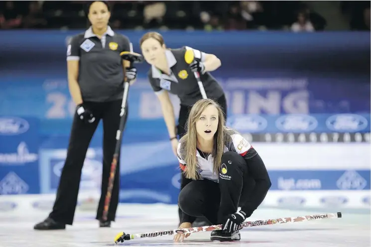  ?? MARK SCHIEFELBE­IN/ASSOCIATED PRESS ?? Skip Rachel Homan reacts during Canada’s 7-3 win over Russia in the 1-2 Page playoff at the World Women’s Curling Championsh­ip in Beijing, Friday.