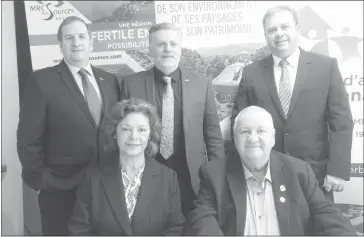  ?? GORDON LAMBIE ?? Back: Jacques Madore, Prefect of the Coaticook MRC; Luc Cayer, Prefect of the Val-saint-francois MRC; Jacques Demers, Prefect of the Memphremag­og MRC. Front: Mercedes Orellana, Executive Director of the Service d'aide aux Neo-canadiens and Pierre...