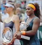  ?? — GETTY IMAGES FILES ?? Serena Williams, right, poses with Maria Sharapova at the French Open tennis final in Paris in 2013.