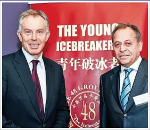  ??  ?? HONORARY FELLOW: Tony Blair with Mr Perry at the 48 Group do in 2010