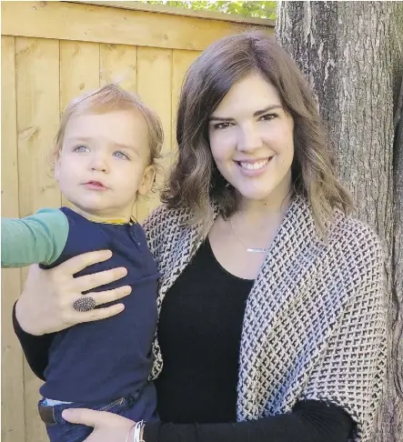  ??  ?? Fort McMurray teacher Elizabeth Dessureaul­t, seen here with 18-month old son Jack, was diagnosed with Stage IV non-small cell lung adenocarci­noma cancer when she was five months pregnant. She died Feb. 25.