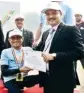  ??  ?? ONGC CMD Shashi Shanker felicitate­s the winners of Men’s 100m wheelchair race