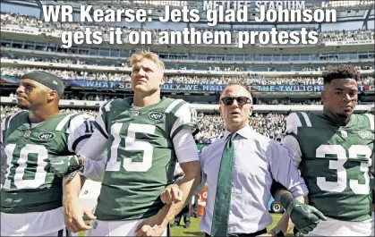  ?? Getty Images ?? ARM IN ARM: Jermaine Kearse (10) says the Jets appreciate that CEO Christophe­r Johnson (linking arms with players during the national anthem last September) has said he will pay fines if players kneel in protest this season.