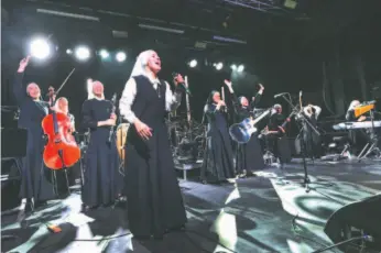  ?? AP PHOTO ?? Siervas, a nun rock band, performs live at the Festival de Cristo at Christ Cathedral in Garden Grove, Calif.