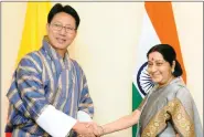  ?? IANS ?? External Affairs Minister Sushma Swaraj holds bilateral meeting with Bhutan’s Foreign Minister Damcho Dorji amid the Doklam stand-off, in Kathmandu, on Thursday.