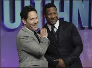  ?? PHOTO BY SCOTT GARFITT/ INVISION/AP ?? Paul Rudd, left, and Jonathan Majors pose for photograph­ers upon arrival for the premiere of ‘Ant Man and The Wasp: Quantumani­a’ in London, Thursday, Feb. 16, 2023.
