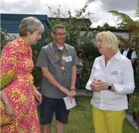  ?? ?? Maidenhead MP, Rotary president Martin Trepte and Open Gardens organiser Janet Perry.
