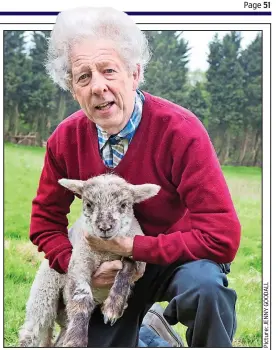  ??  ?? Country matters: Laurence Keeley and one of his lambs