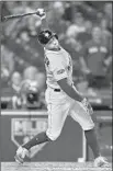  ?? Bob Levey Getty Images ?? HOUSTON’S George Springer strikes out for the final out against the Red Sox.