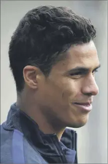  ?? (Photo AFP) ?? Raphaël Varane garde le sourire, en façade...