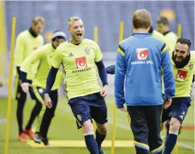  ??  ?? STOCKHOLM: Sweden’s forward John Guidetti (L) and Abdul Rahman Khalili (R) take part in a training session of the Swedish national football team at Friends Arena in Stockholm, Sweden, yesterday. Sweden will play against Denmark in the Euro 2016...