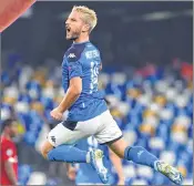  ??  ?? Napoli's Belgian forward Dries Mertens celebrates after scoring a penalty against Liverpool at San Paolo stadium in Naples on Tuesday