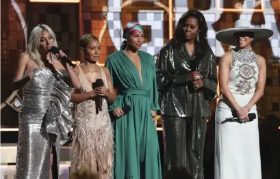  ?? Bild: Matt Sayles ?? Lady Gaga, Jada Pinkett Smith, Alicia Keys, Michelle Obama och Jennifer Lopez på Grammygala­n.
