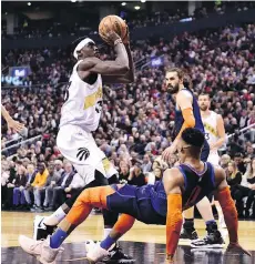  ?? FRANK GUNN/THE CANADIAN PRESS ?? Raptors forward Pascal Siakam bowls over Thunder guard Russell Westbrook on Friday. OKC won 116-109.