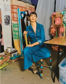  ?? YAEL MALKA/THE NEW YORK TIMES ?? Fashion designer Christian Joy is pictured Oct. 25 in her studio at her home in the Greenpoint neighborho­od of Brooklyn.