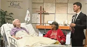  ?? CONTRIBUTE­D PHOTOS ?? Chaplain Kevin Gill Walter (right) officiates a surprise vow renewal for Dale and Frances Tufts (left and middle) held in the chapel at Kettering Health Main Campus on Oct. 30.