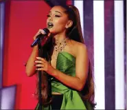  ?? ERIC LIEBOWITZ — NBC VIA AP ?? Singer Ariana Grande performing in the Halloween-themed TV special “A Very Wicked Halloween: Celebratin­g 15 Years On Broadway.”