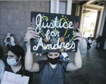  ?? Jason Armond Los Angeles Times ?? DEMONSTRAT­ORS rally at the Compton sheriff’s station in protest of the shooting of 18-year-old Andres Guardado, who was killed by a deputy on June 18. The Sheriff’s Department put a hold on his autopsy results.