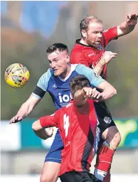  ??  ?? Action stations: Rory McAllister tussles with Cowdenbeat­h’s Brian Gilfillan and Jamie Pyper