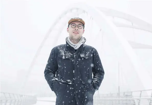  ?? AMBER BRACKEN ?? Architect Josh Kjenner, seen on the recently completed Walterdale Bridge Tuesday, says the dazzling crossing is in a class of its own.