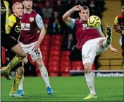  ??  ?? TURN A CORNER: Chris Wood opens the scoring for Burnley after Watford’s defence fails to clear