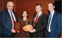  ??  ?? Polish ambassador to Ireland Anna Sochanska receiving presentati­ons from Cllr Joe Sullivan, Cllr Malcolm Byrne and district manager Michael Drea.