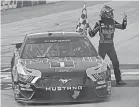  ?? PETER CASEY/ USA TODAY SPORTS ?? Kevin Harvick celebrates winning the Drydene 311 on Sunday at Dover Internatio­nal Speedway.