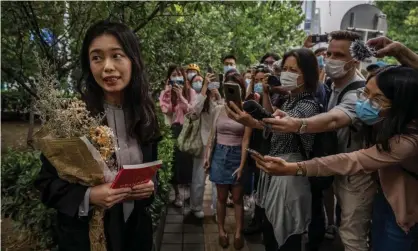  ?? ?? Zhou Xiaoxuan with her supporters outside the Haidian people’s court in Beijing. Photograph: Kevin Frayer/Getty Images