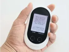  ??  ?? Dedicated for just one purpose, Pocketalk, which translates phrases to and from 74 languages, has a sensitive microphone, and accesses machine translatio­n and voice-recognitio­n software from Google, Baidu and others, improving accuracy.