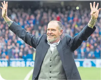  ??  ?? Paul Gascoigne salutes the crowd during a return trip to Ibrox back in February