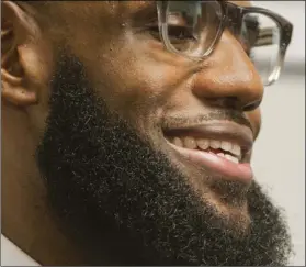  ??  ?? LeBron James speaks at a news conference after the opening ceremony for the I Promise School in Akron, Ohio, on Monday. (AP PHOTO/PHIL LONG