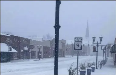  ?? Special to the MDR ?? Snow covers the streets of downtown Malvern Monday.