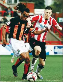  ??  ?? CLASS ACT: Barnet’s Edgar Davids and Exeter’s Alan Gow