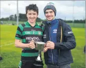  ?? ?? Ethan Quinn of Glenroe U15 hurling team that won the Division 2 County Championsh­ip last Saturday, September 24th, in Rathkeale, proudly pictured with Limerick U21 and Senior All-Ireland hurling championsh­ip winner, Dave McCarthy of Glenroe.