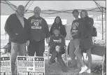  ?? ELIZA FAWCETT/HARTFORD COURANT ?? Killingly Republican candidates Kevin Kerttula (far left), Norm Ferron (second from left) and Jason Muscara (second from right) on Election Day, Nov. 5. The mascot issue turned Republican voters out in droves.